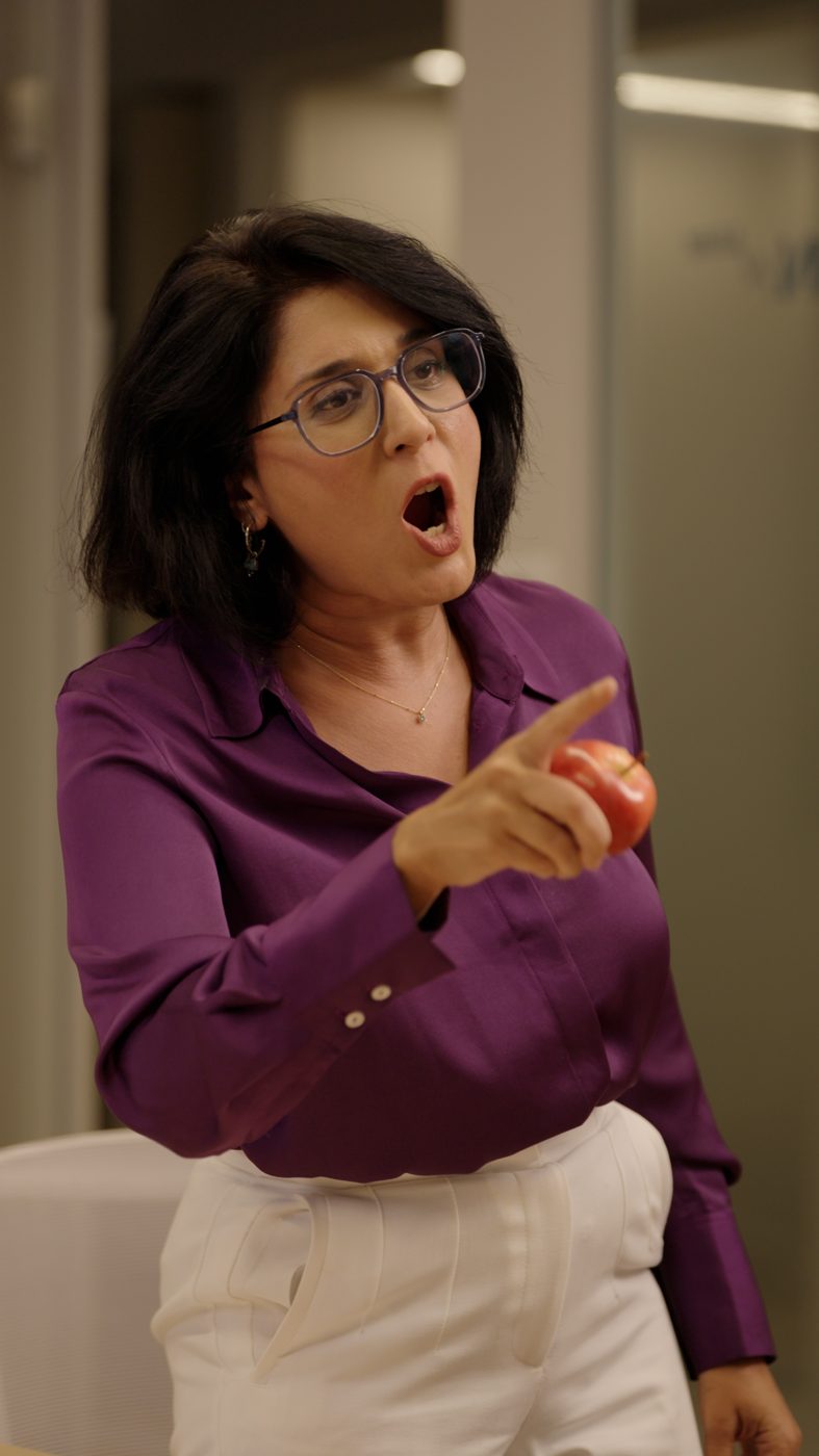 Rachel pointing, mid-shout